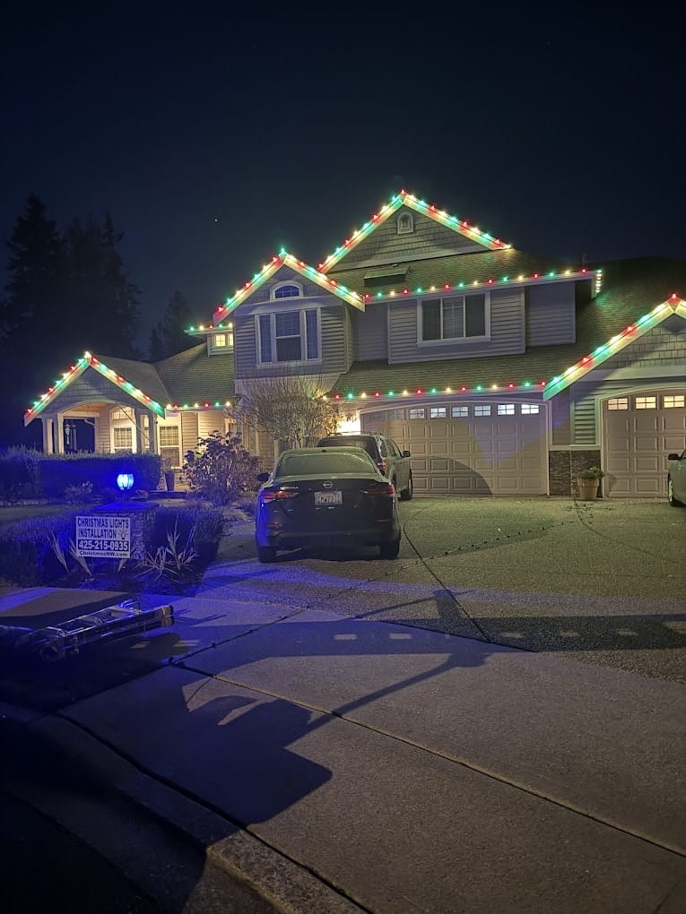 Multicolor roofline installation on large home