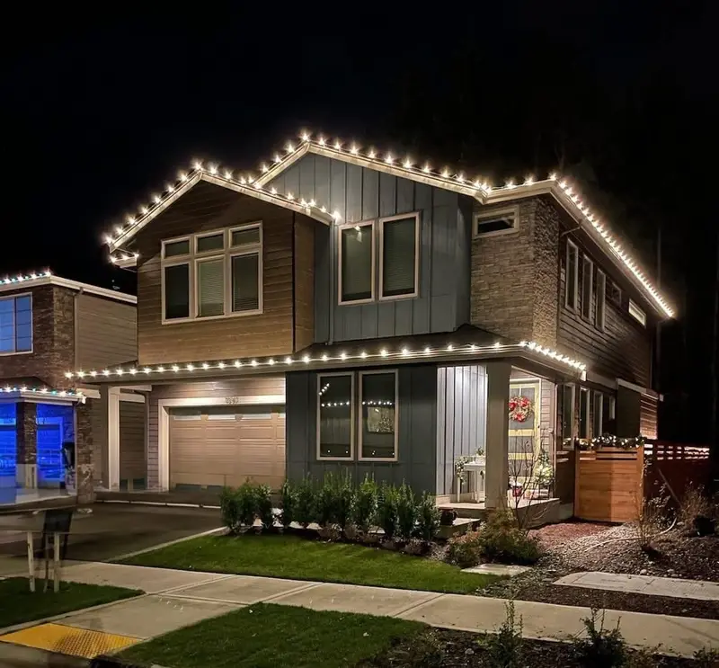Two-story home with a clean warm white roofline